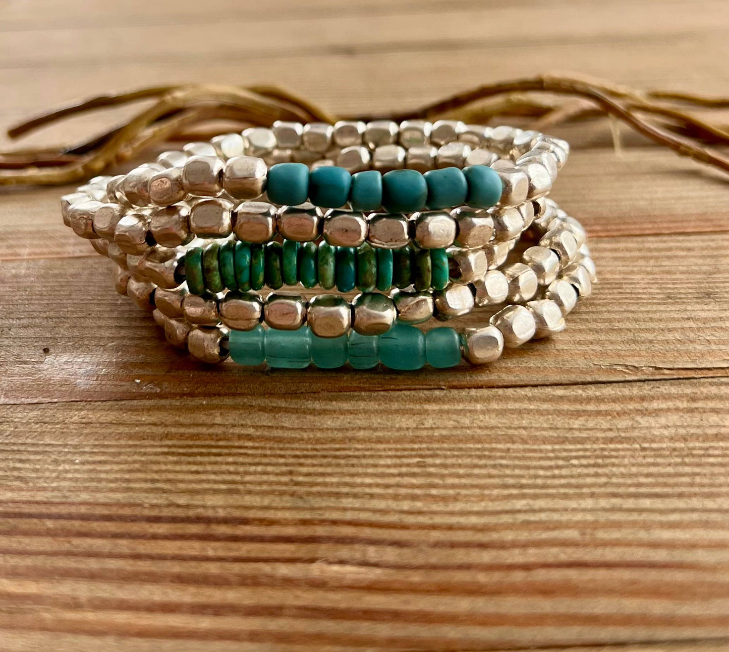 Rock The Bells- turquoise glass silver metal stretch bracele